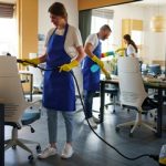 professional-cleaning-service-person-using-vacuum-cleaner-office-